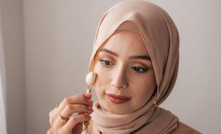 Skincare Routine - Woman in Brown Hijab Covering Her Face