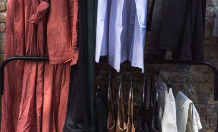 Designer Brands - Clothes on Clothes Rack