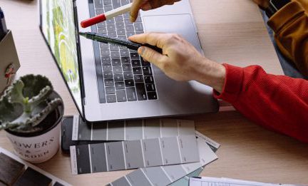 Designers - Designers Working on Laptop in Office